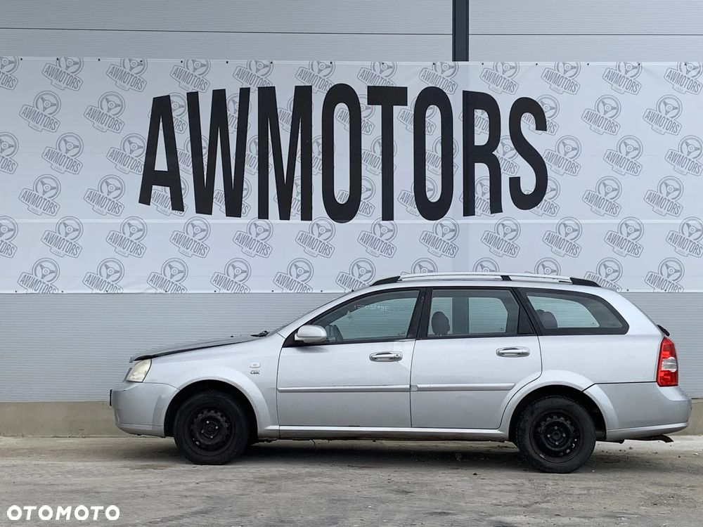 CHEVROLET NUBIRA 2006 *SAMOCHÓD NA CZĘŚCI* 1203MASKA, LAMPA, DRZWI, LUSTERKO, ZDERZAK, GRILL, BŁOTNIK, KLAPA, BELKA, DESKA, FOTELE, KANAPA, ĆWIARTKA KIEROWNICA, TARCZE, ZACISKI, ZAWIESZENIE, KOMPLETNY PRZÓD, KOMPLETNY TYŁ, LICZNIK, ZEGARY, PRAWE LEWE PRZÓD TYŁ - 3