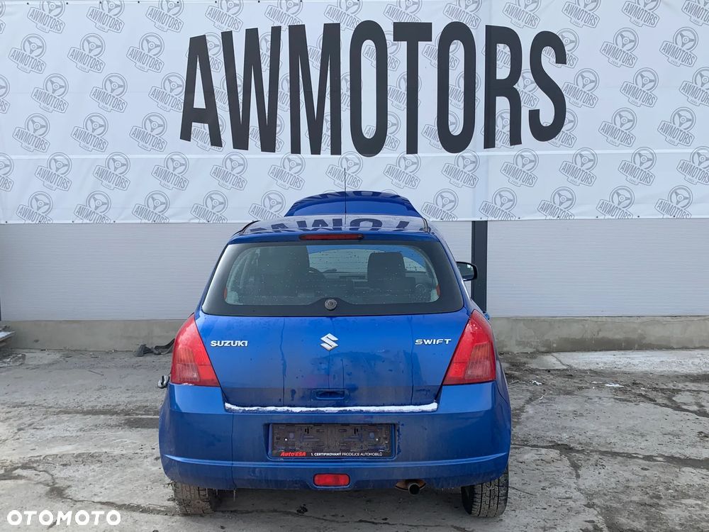 SUZUKI SWIFT 2005 *SAMOCHÓD NA CZĘŚCI* 4042 MASKA, LAMPA, DRZWI, LUSTERKO, ZDERZAK, GRILL, BŁOTNIK, KLAPA, BELKA, DESKA, FOTELE, KANAPA, ĆWIARTKA KIEROWNICA, TARCZE, ZACISKI, ZAWIESZENIE, KOMPLETNY PRZÓD, KOMPLETNY TYŁ, LICZNIK, ZEGARY, PRAWE LEWE PRZÓD TYŁ - 4