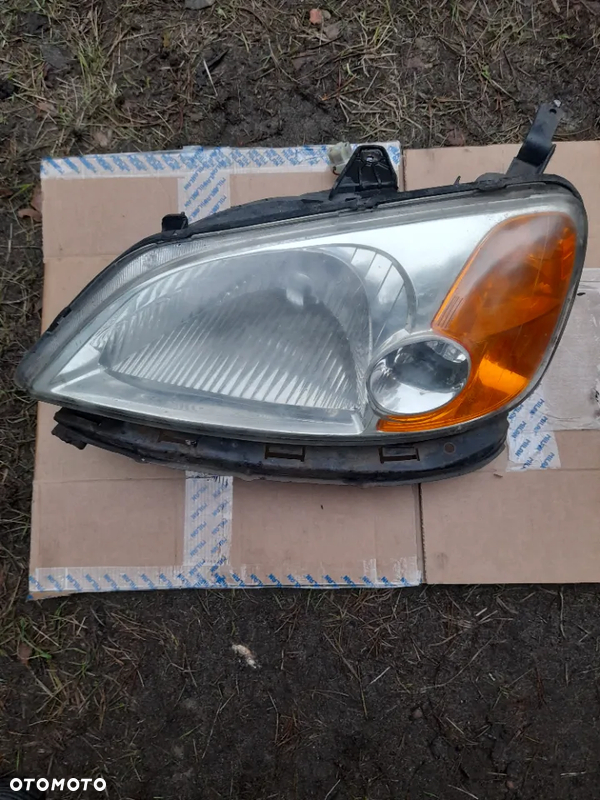 HONDA CIVIC,VII. (00-06).lampa przod (lewa)