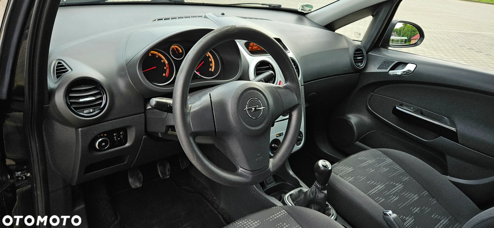 Opel Corsa 1.4 16V Active - 9