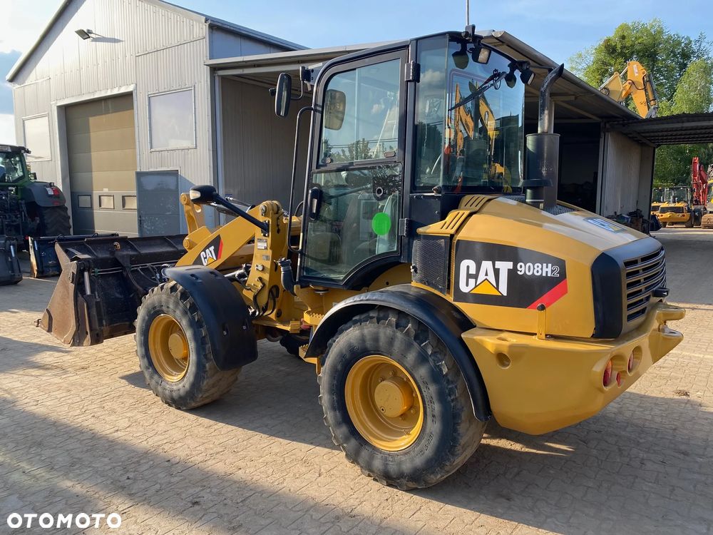 Caterpillar CAT 908H2, 6200 MTH, ŁYŻKA OTWIERANA + WIDŁY, z NIEMIEC, - 6