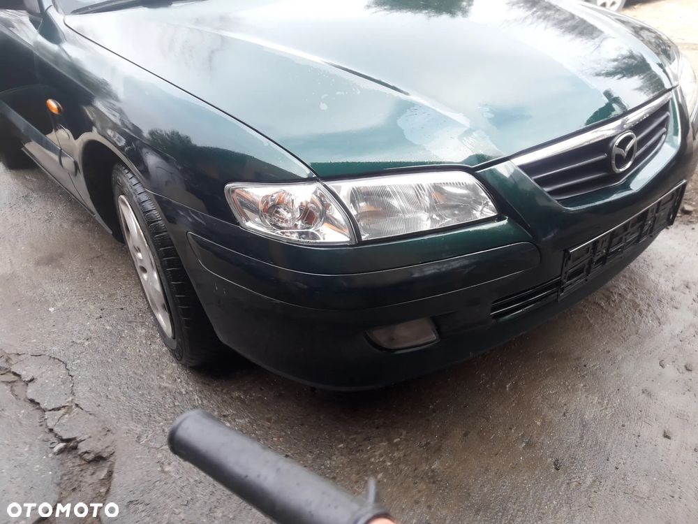 Mazda 626 GF GW 97-02 LIFT    Maska lampa zderzak pas atrapa 18J - 2