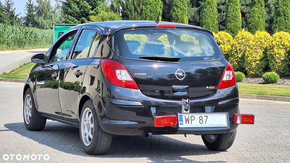 Opel Corsa 1.4 16V Cosmo - 30