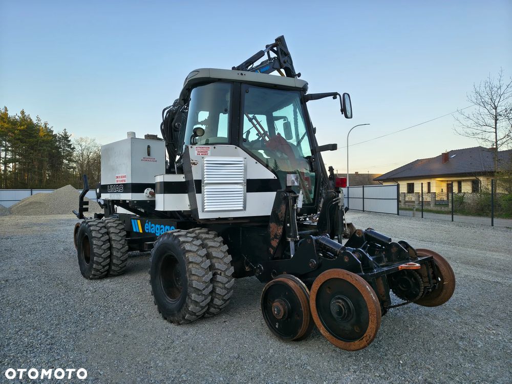 Caterpillar UNAC 300RR Mulczer kolejowy Liebherr atlas dwudrogowy zw - 10