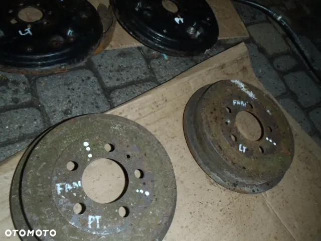bęben bębny osłona tarcza kotwiczna cylinderek piasta łożysko czop tylne zawieszenie fabia polo ibiza passat b5 jak nowe oryginaał - 11