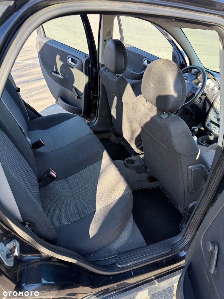 Opel Corsa 1.2 16V Enjoy - 10