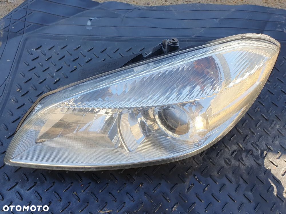 SKODA ROOMSTER FABIA II LAMPA REFLEKTOR PRZÓD LEWY EUROPA 173203 HELLA - 1