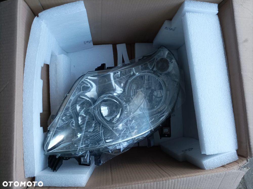 DUCATO JUMPER BOXER 06-14 reflektor lewy nowy org. 1369497080 - 1