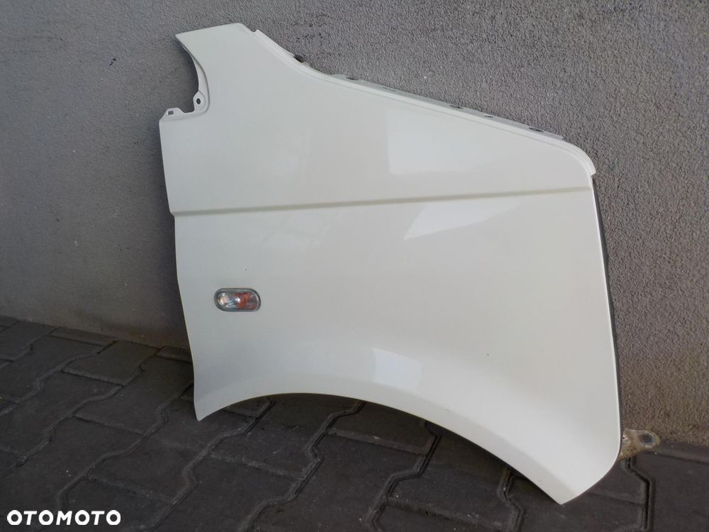 VW T5 04- BŁOTNIK PRAWY BIAŁY L902 ŁADNY - 2