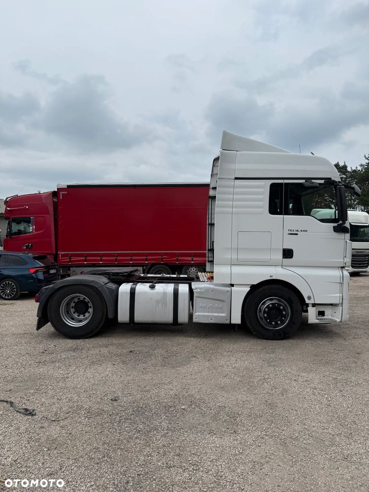 MAN TGX 18.440 XLX AUTOMAT SPOJLERY KLIMA WEBASTO LODÓWKA 685000km MOTOR:12.5L OPONY:315/80/22.5-80% 2xALUTANK EURO 6 2014 - 6