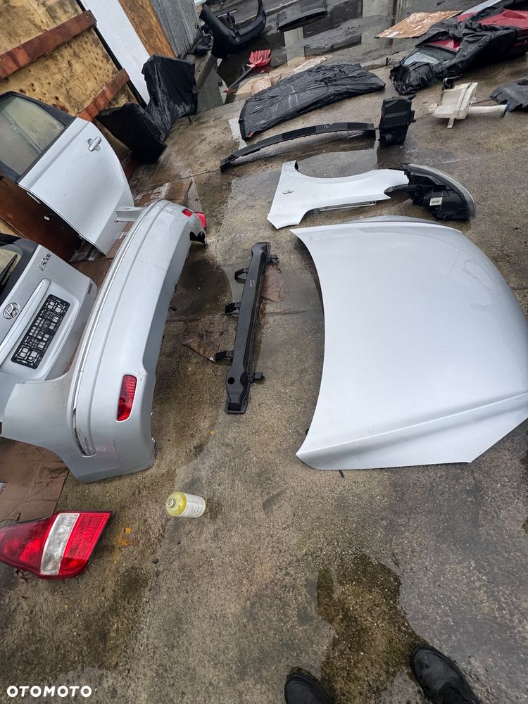 Hyundai i30 srebrny szary kolor 2R XP zderzak przód przedni pas przedni z chłodnicami lampy lampa soczewki soczewka soczewkowe maska srebrna błotnik prawy lewy przedni zbiornik zbiorniczek spryskiwaczy płynu podszybie drzwi szybka prawa lewa przednia tylnia drzwi przednie tylne prawy przód prawy tył przód lewy tył lewy klapa bagażnika bagażnik zderzak tylni tył kombi lampy tył tylnie prawa lewa belka przód przednia belka tylnia tył obudowa filtra powietrza lusterko prawe lewe - 13