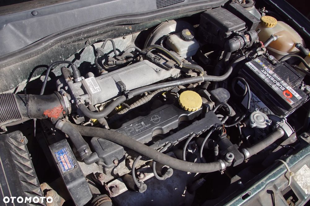 Auto na części - Opel Astra G II 1.6 8V 84 KM Z16SE F13 42U 2001R Silnik Skrzynia Drzwi Maska Zderzak Błotnik Klapa Lusterko Lampa Klamka Szyba Deska Kokpit Sterownik Moduł Czujnik Licznik Panel Kierownica - 17