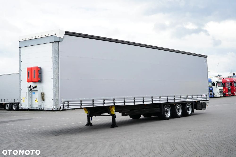 Schmitz Cargobull / FIRANKA / MEGA / MULTI LOCK / XL / OŚ PODNOSZONA - 1