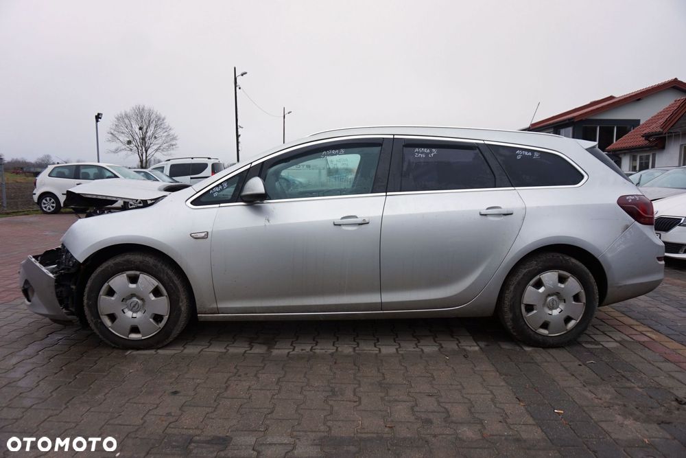 OPEL ASTRA IV J KOMBI 2011 Z176 1.7 CDTI A17DTR 125KM M32 SREBRNY na części - 2