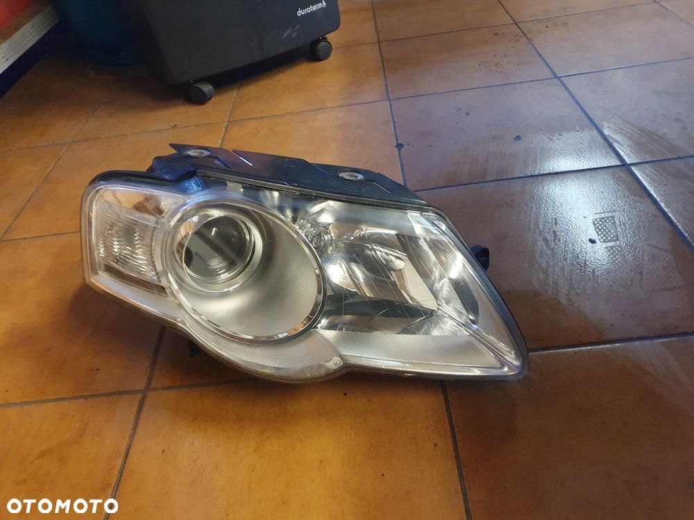 REFLEKTOR PRAWY VW PASSAT B6 HELLA EUROPA - 1