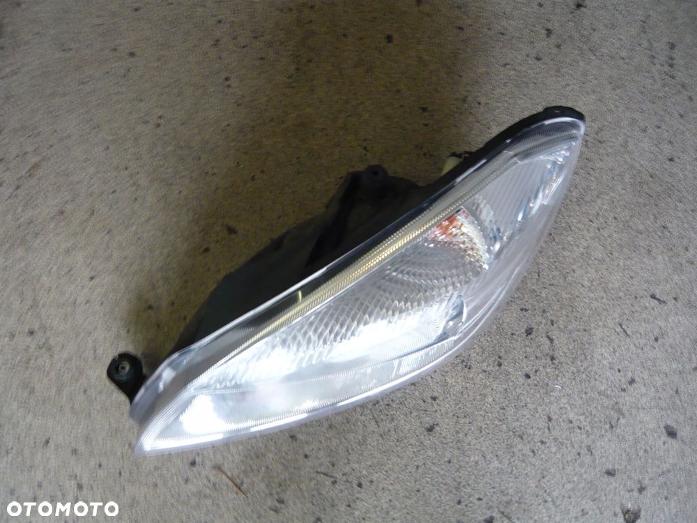 reflektor lampa lewa przód skoda fabia roomster lift - 2