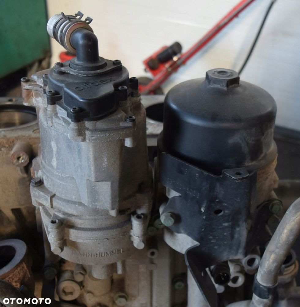 PODSTAWA FILTRA OLEJU MAN TGX TGS E6 D20 D26 - 1