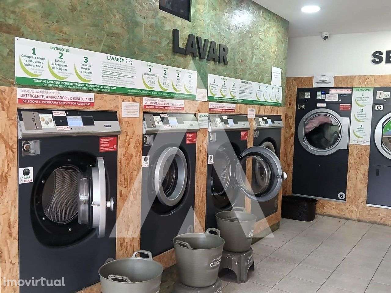 Lavandaria no centro de Oliveira do Bairro - Grande imagem: 2/17