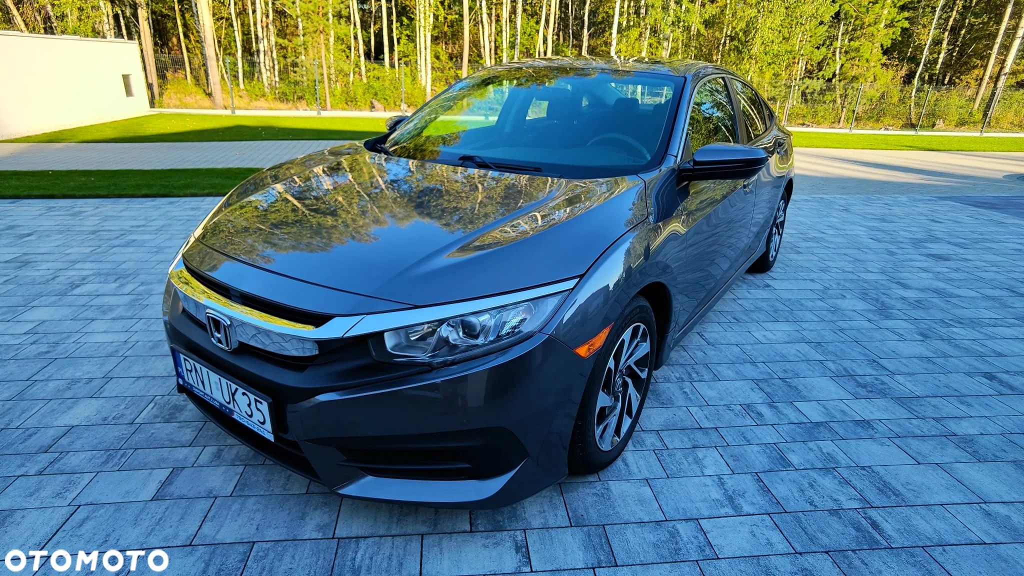 Honda Civic 2.0 i-VTEC LX CVT - 1