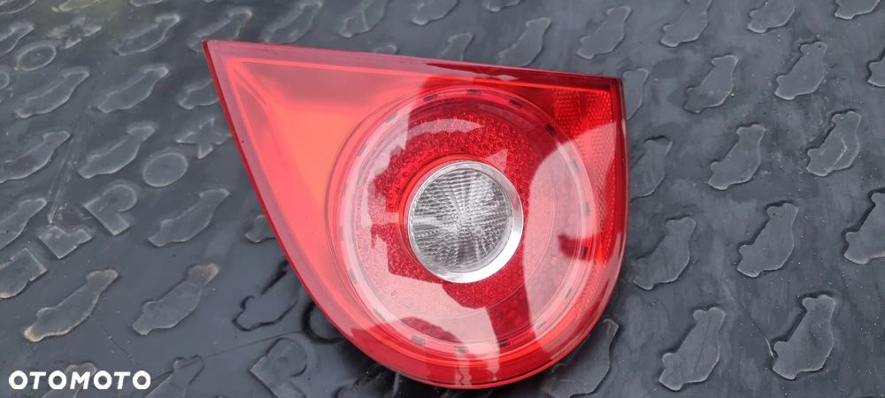 Lampa lewy tył w błotnik VW GOLF V 1K6945094F  EU