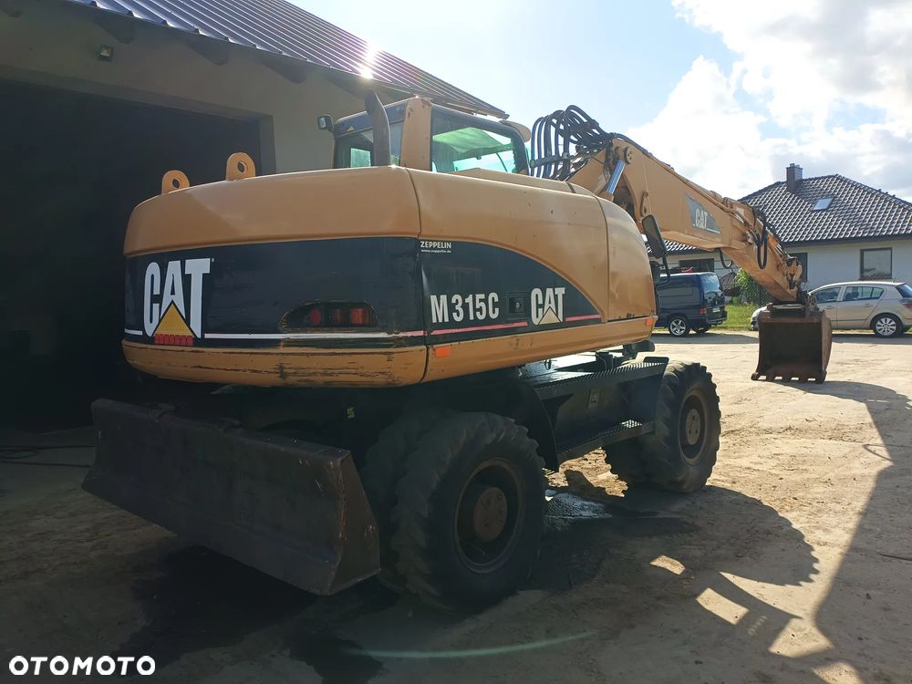 Caterpillar M315C - 3