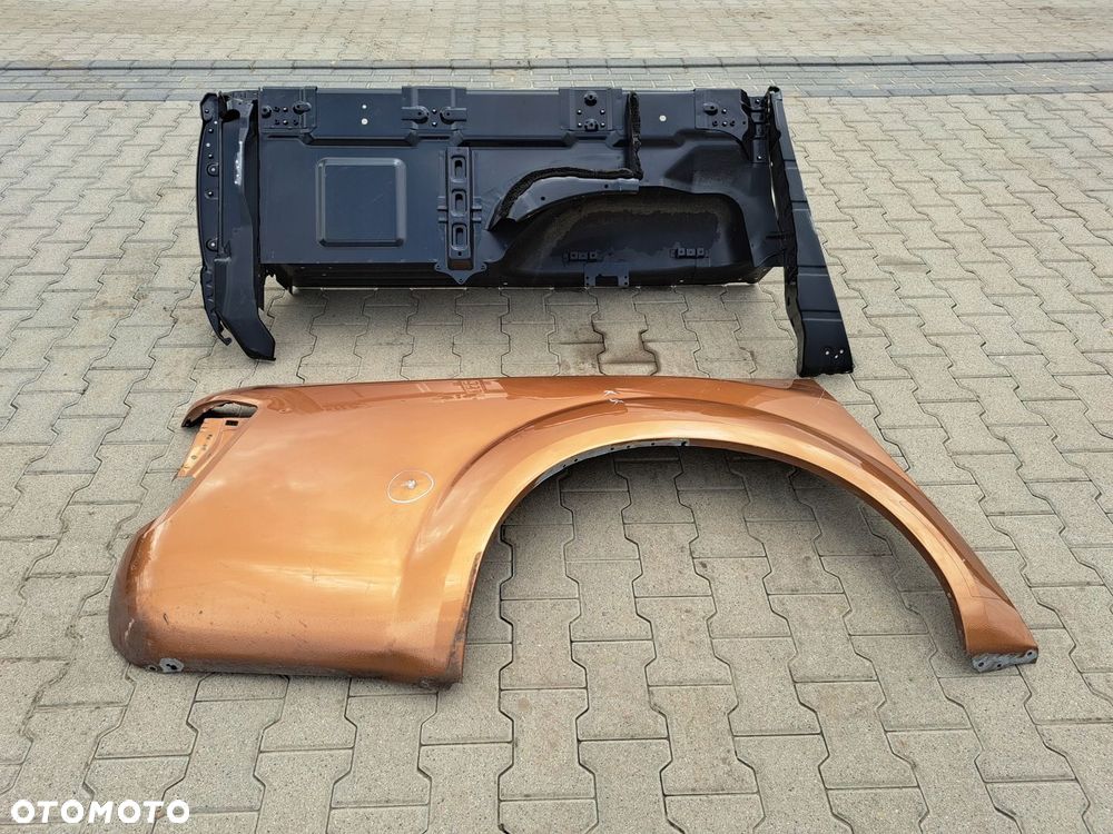BŁOTNIK TYLNY TYŁ PRAWY NISSAN NAVARA 2015 - - 2