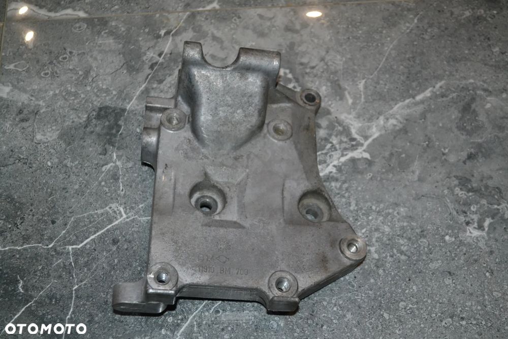 NISSAN PRIMERA P12 ALMERA N16 BENZYNA ŁAPA WSPORNIK MOCOWANIE SPRĘŻARKI KLIMATYZACJI 11910BM700