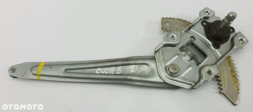 MECHANIZM PODNOŚNIK SZYBY LEWY TYŁ DAIHATSU CUORE - 1