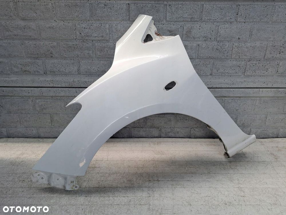 BŁOTNIK PRZEDNI LEWY MAZDA 2 II 2007-14 ORYGINAŁ