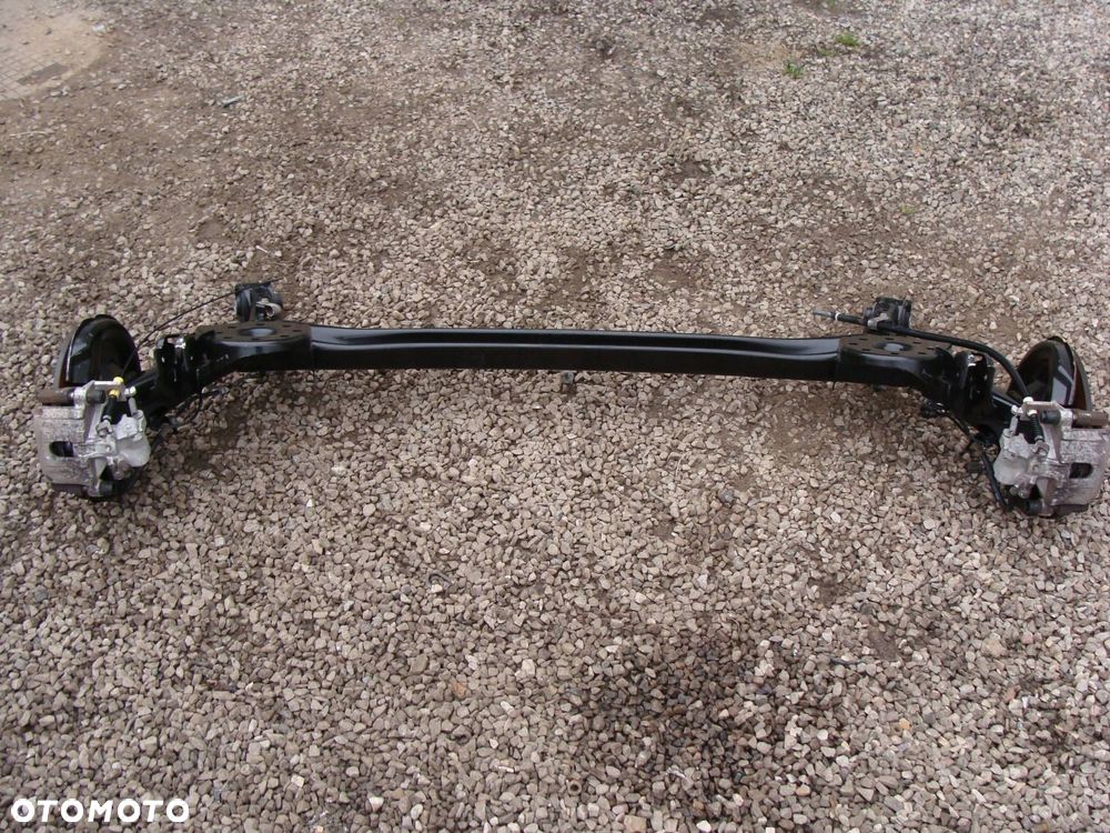 oś tylna belka kompletna toyota yaris ii iii nie malowana !! oryginał !! - 6