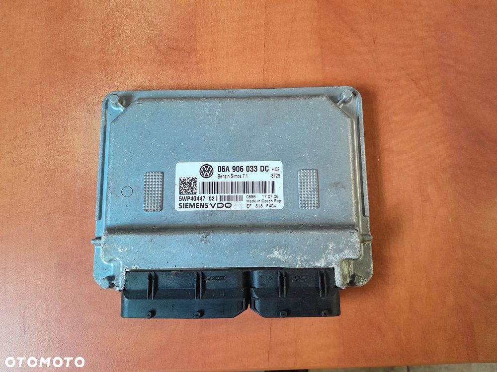 Sterownik silnika VW Golf V Plus 04-08r. 1.6 8v 102KM 06A906033DC - 1