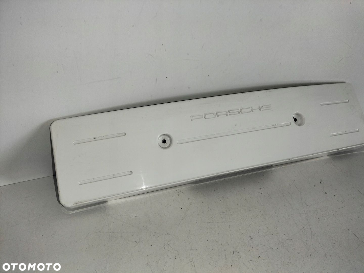 Podkładka pod tablicę rejestracyjną przód PORSCHE PANAMERA II 971 16- - 2
