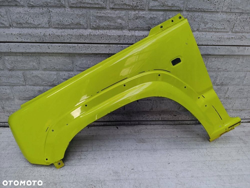 SUZUKI JIMNY 18 - 24 BŁOTNIK PRZEDNI LEWY ORYGINAŁ - 1