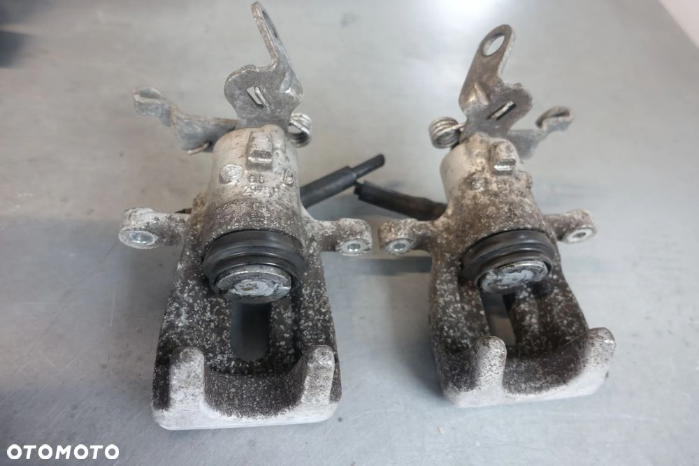 ZACISK LEWY PRAWY TYŁ LEON III OCTAVIA III TRW 12r.- - 4