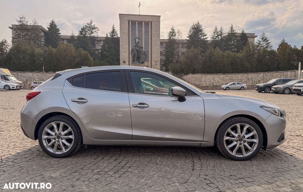 Mazda 3 G165 Revolution - 1