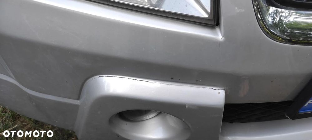 Suzuki Grand Vitara 1.6 - 12