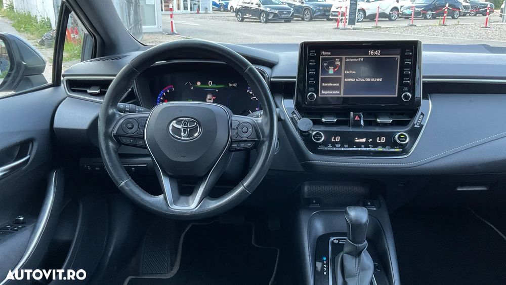 Toyota Corolla 1.8 HSD Business - 10