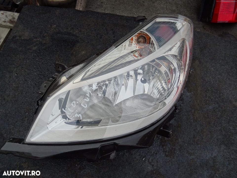 Far stanga Renault Clio 3 din 2006 volan pe stanga - 1