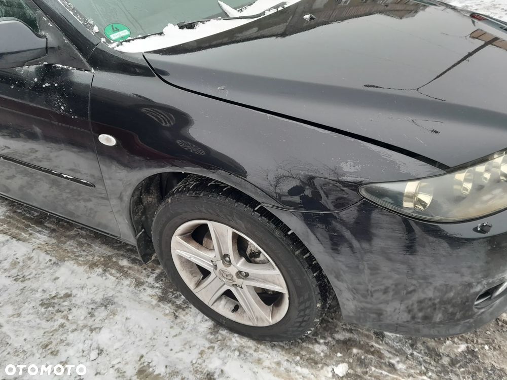 Błotnik przedni prawy MAZDA 6 GG lift 05-07r. 16W - 2