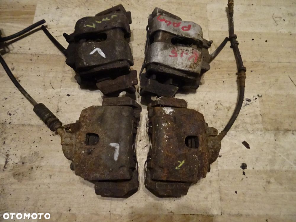 FORD MAVERICK MAZDA TRIBUTE PRZOD PRZEDNI ZACISK HAMULCOWY LEWY PRAWY JAZMO LIFTING ORAZ PRZED LIFTING