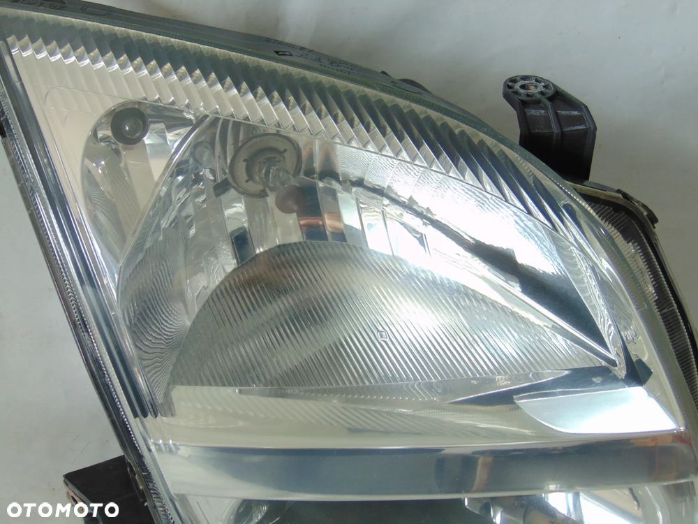 ORYGINAŁ lampa przednia przód prawa Suzuki Ignis 2 II 03-07r - 2