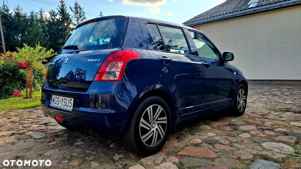 Suzuki Swift 1.3 Club - 7