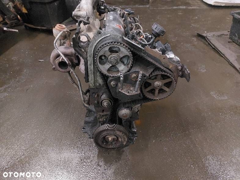 SILNIK DIESEL Z UKŁADEM PALIWOWYM I TURBINĄ MITSUBISHI CARISMA I FL F9QT - 4