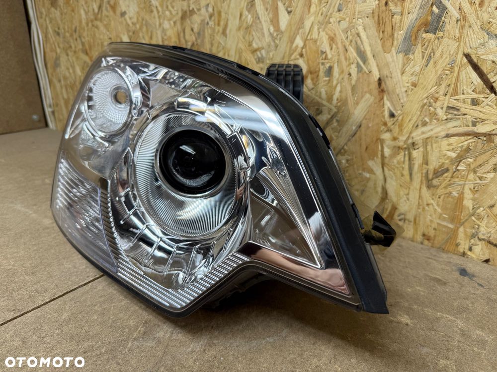 LAMPA PRAWA XENON OPEL ANTARA LIFT - 13