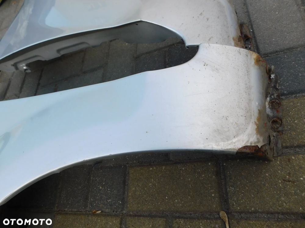 błotnik lewy przód FORD FOCUS II LIFT FL  03 - 5