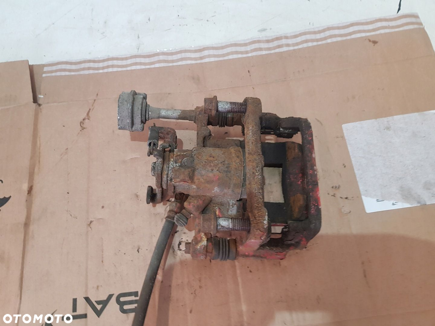 ZACISK HAMULCOWY PRAWY TYŁ OPEL ASTRA J EUR - 4