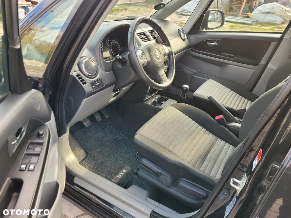 Suzuki SX4 1.6 Comfort Plus - 17