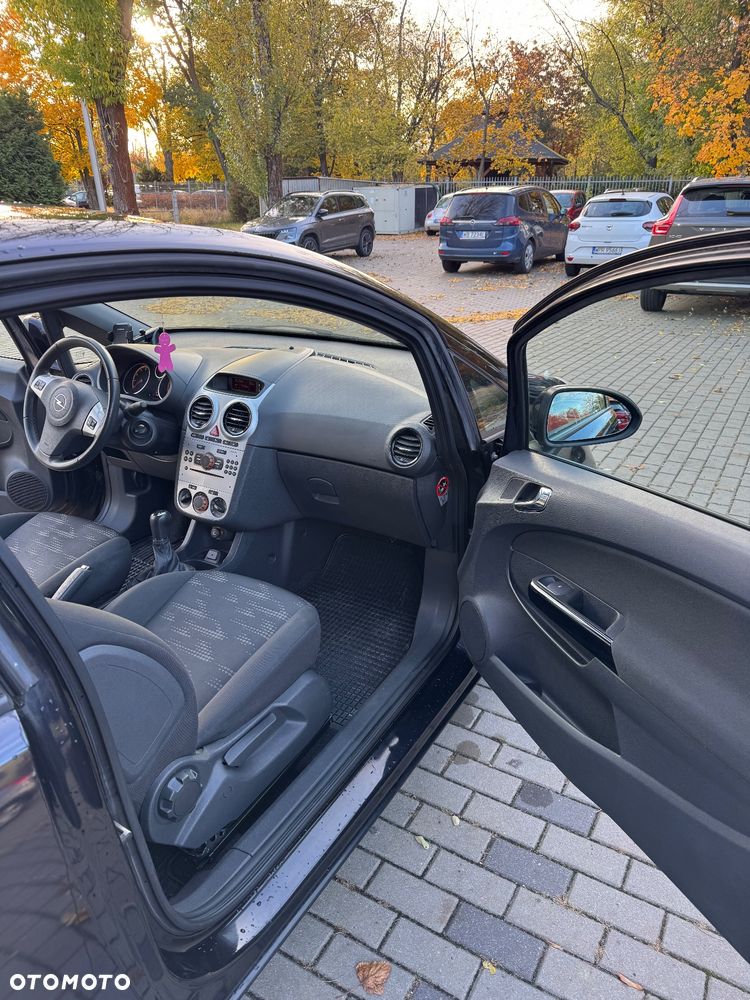 Opel Corsa 1.4 16V Satellite - 12