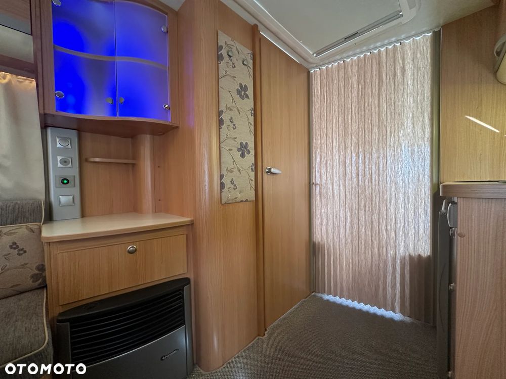 Adria ADORA 472 LU z napędem i markizą ze ścianami.  DMC 1300 - 21