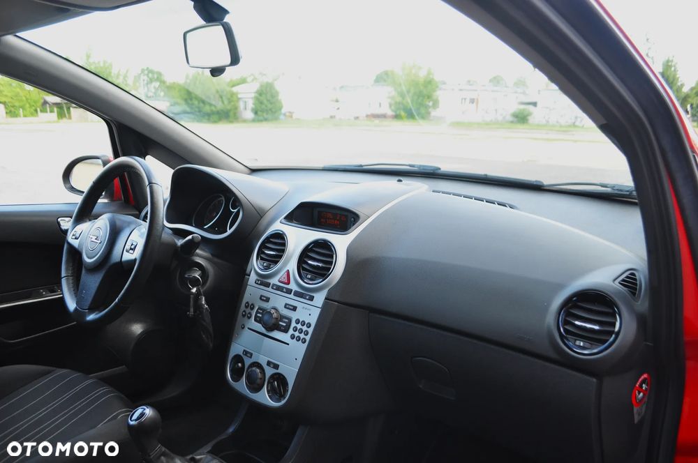 Opel Corsa 1.4 16V Enjoy - 23